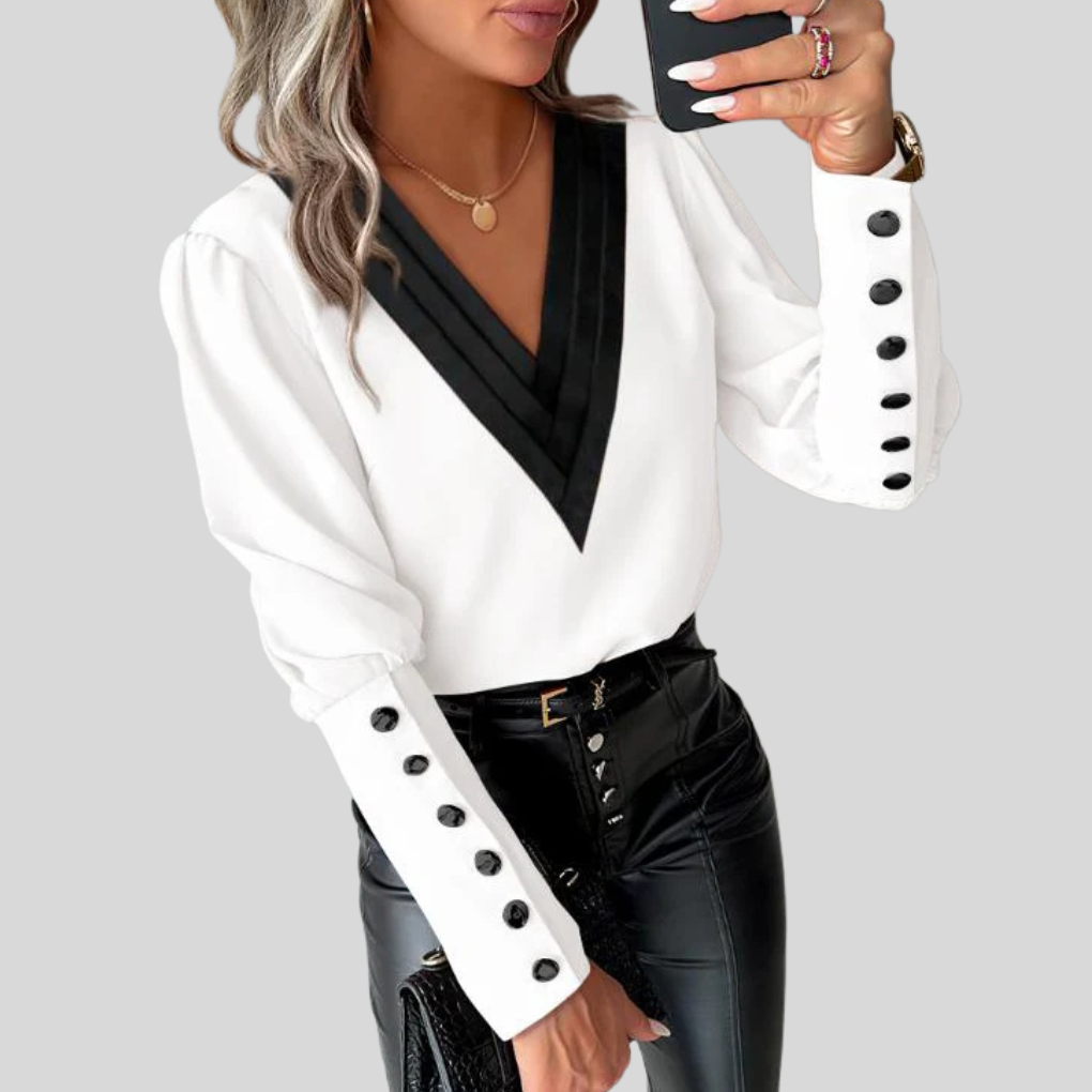 Damebluse med knapper og puffede ermer – Statement-erme med uformell eleganse