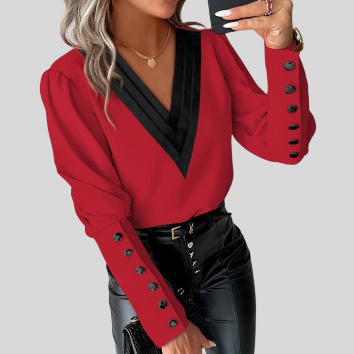 Damebluse med knapper og puffede ermer – Statement-erme med uformell eleganse