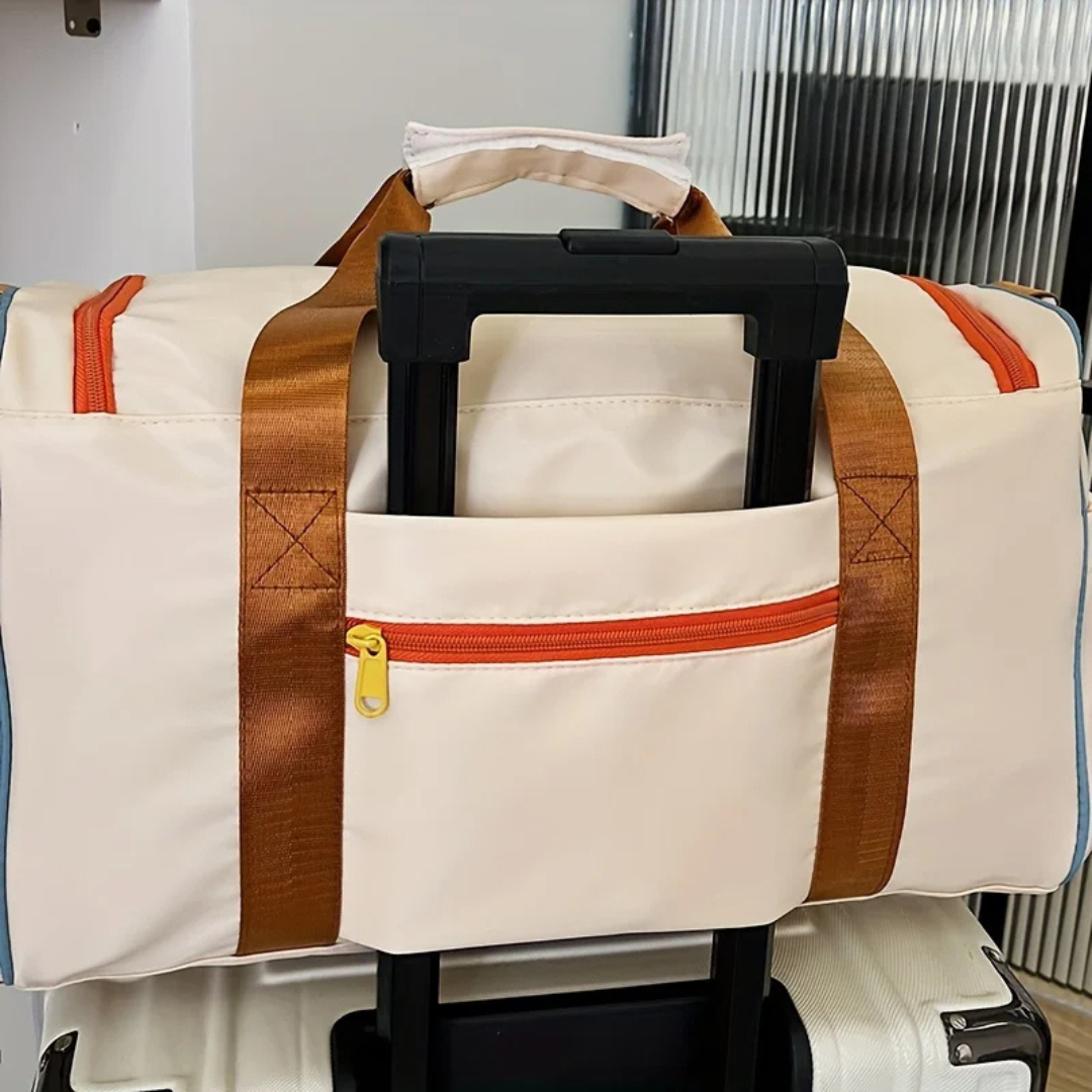 Lett reiseveske med fargeblokker - FlexaBag