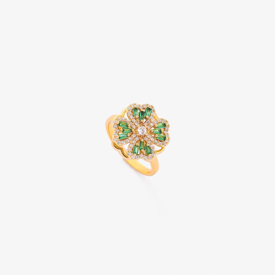 Elegant gullring med roterende kløverblad