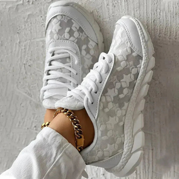 Breathable sneakers with star pattern and lace-up closure for women