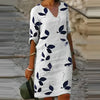 Sommerkleid mit Blattdruck und elegantem V-Ausschnitt