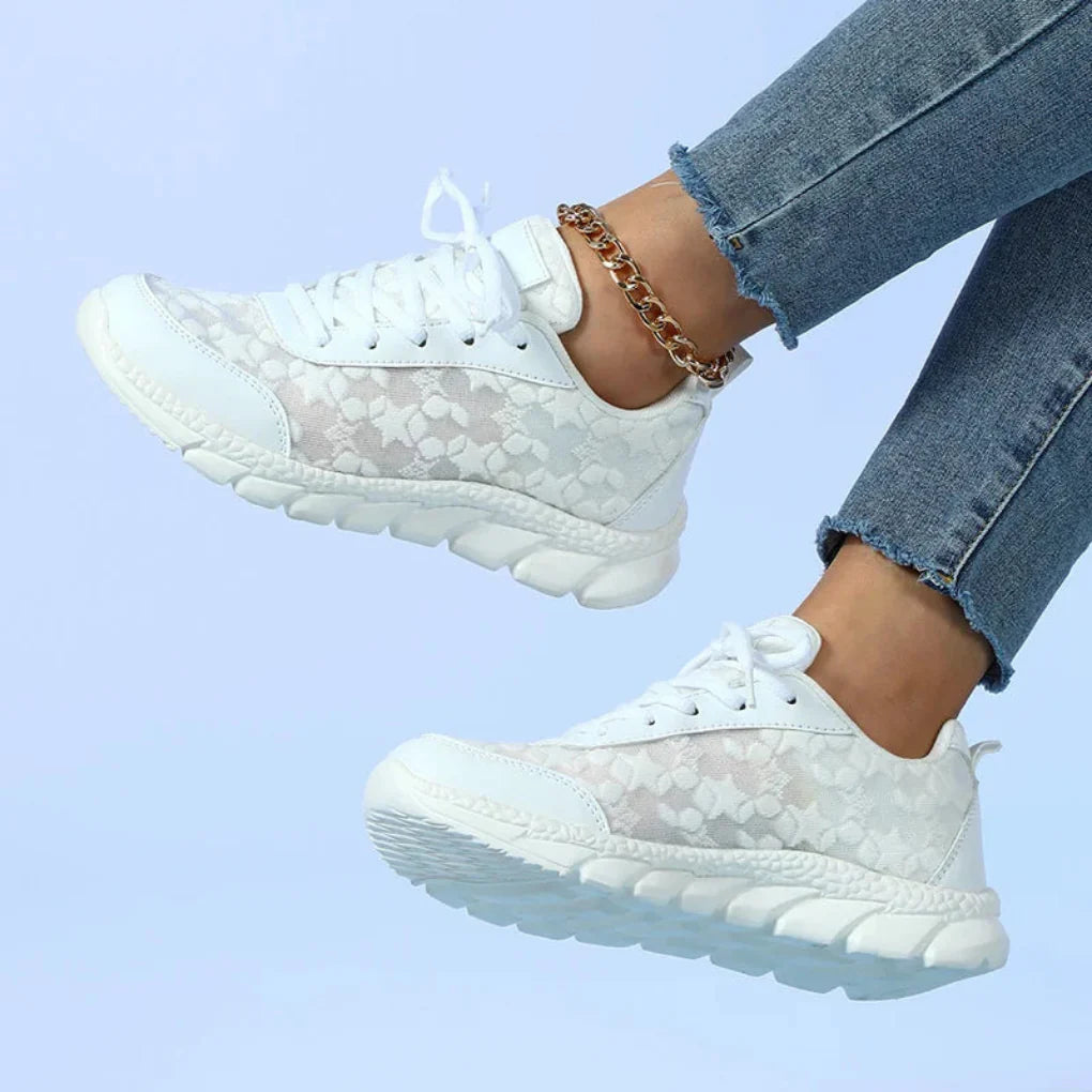 Breathable sneakers with star pattern and lace-up closure for women