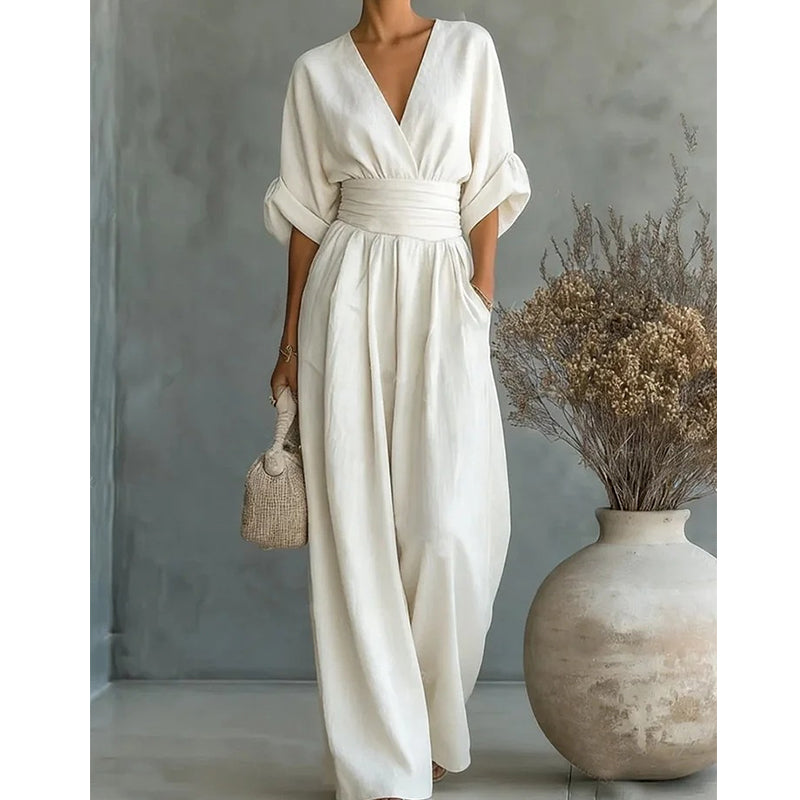 Elegant jumpsuit for damer med vide bukseben, V-utringning og flytende snitt
