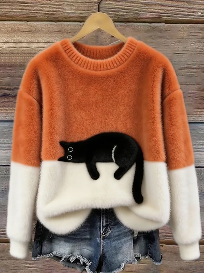 Oversized genser med kattetrykk