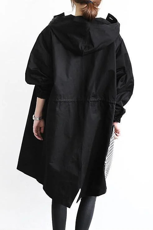 Waterproof, oversized trench coat in mid-length model