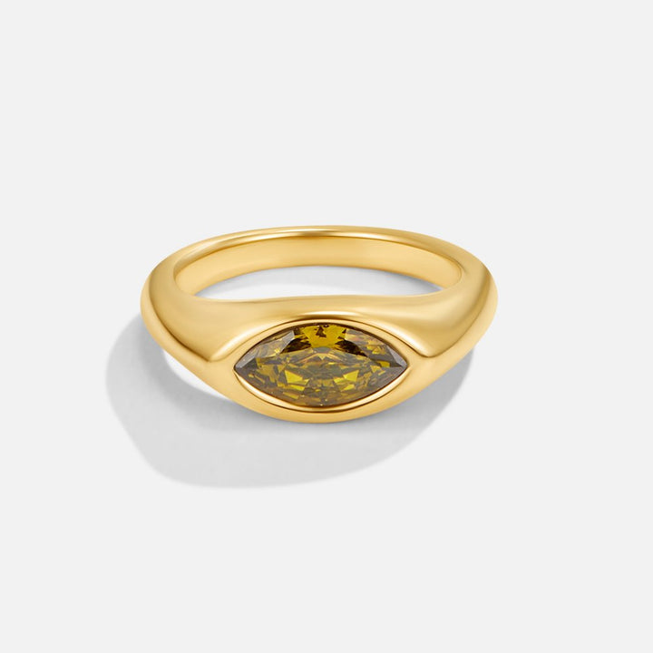 Raffinert ring med grønn zirkonia