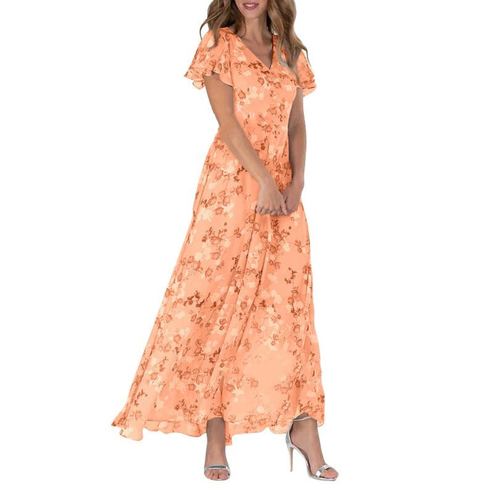 Maxikjole med sommerfuglsærmer og blomstermønster