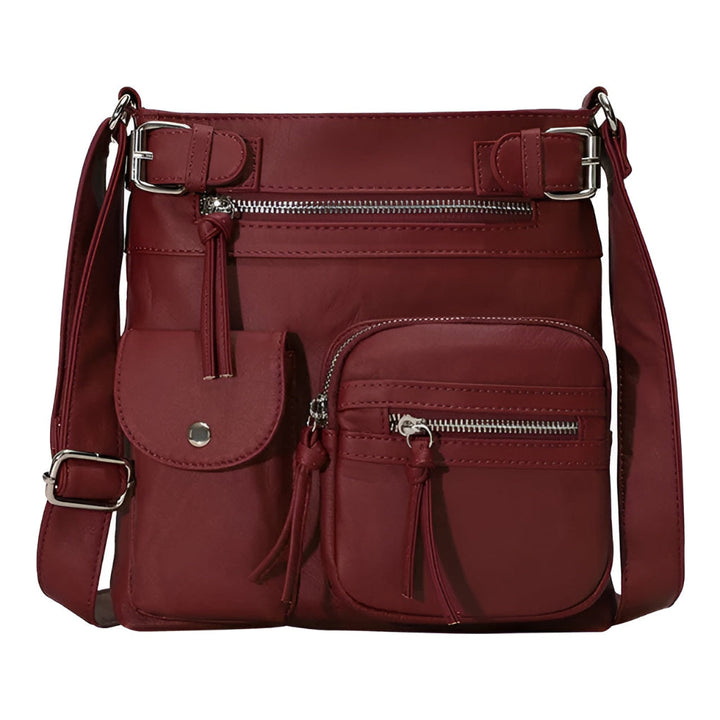 Ladies' leather shoulder bag with multiple pockets
