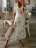 Bohemian Maxi Dress with Off-Shoulder Design and Voluminous Sleeves