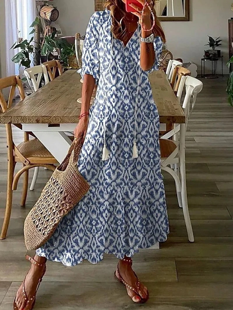 Bohemian Maxi Dress with Off-Shoulder Design and Voluminous Sleeves