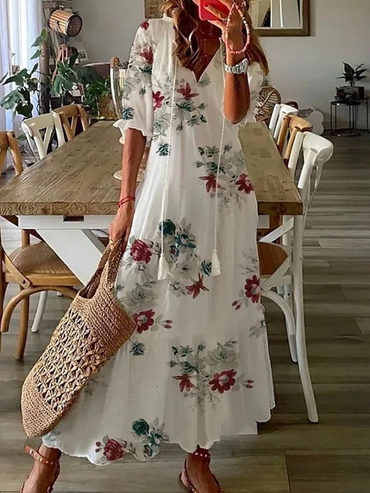 Bohemian Maxi Dress with Off-Shoulder Design and Voluminous Sleeves