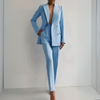 Set with elegant blazer and high-waisted trousers for women