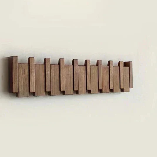 Knaggrekke i tre med pianodesign – Elegant veggorganisator for entreen